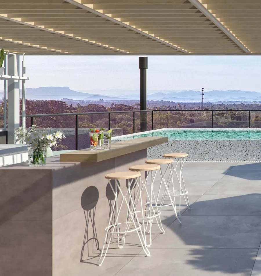 Piscina de borda infinita do Mobby, com poolbar e vista para as montanhas